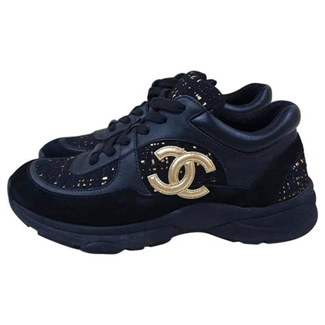 chanel shoes black and gold|Chanel sneakers gold.